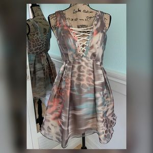 Bebe fit and flare lace up dress, Size 2.